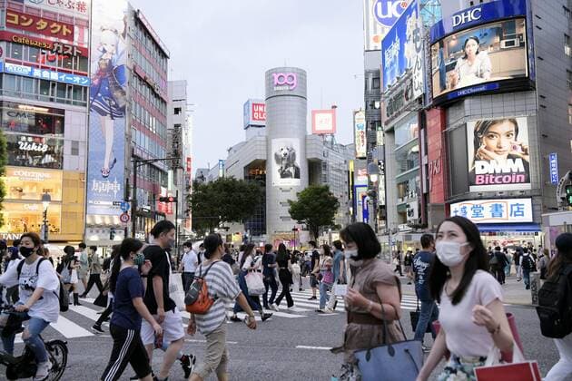 Virus stays rampant in Tokyo People wearing face masks walk in Tokyo s Shibuya area on Aug. 12, 2021, as the capital reported 4,989 new coronavirus cases the same day, the second highest figure after 5,042 infections logged a week earlier.  A14AA0000757691P