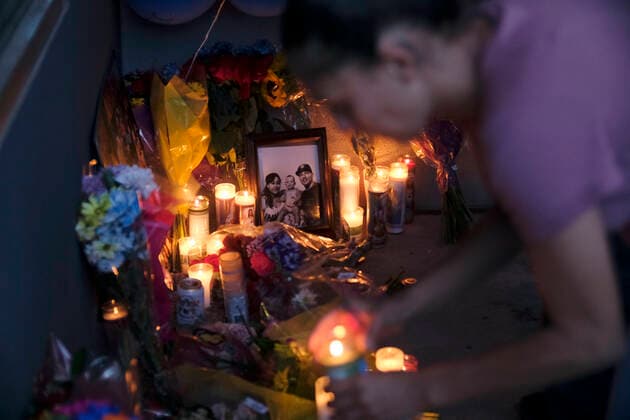 August 13, 2021, NEW MEXICO, USA: 081321.Desiree Trujeque lights a candle for her brother in law Lawrence Anzures who was fatally shot at Ojos Locos Sports Cantina as famiily members and friends gather for a candlelight vigil at the scene of the shooting .Photographed on Friday August 13 , 2021. USA - ZUMAab1_ 20210813_zaf_ab1_021 Copyright: xAdolphexPierre-Louis Journalx