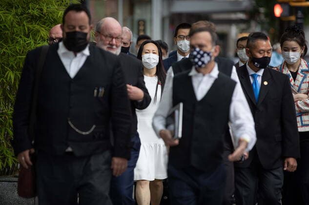August 17, 2021, Vancouver, BC, Canada: Meng Wanzhou, centre, chief financial officer of Huawei, leaves B.C. Supreme Court during a break from her extradition hearing, in Vancouver, on Tuesday, August 17, 2021. Vancouver Canada - ZUMAc35_ 20210817_zaf_c35_037 Copyright: xDarrylxDyckx