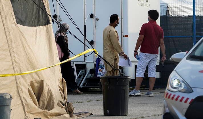 August 17, 2021, Toronto, on, Canada: Refugees from Afghanistan and Canadian Citizens board a bus after being processed at Pearson Airport in Toronto, Tuesday, Aug 17, 2021, after arriving indirectly from Afghanistan. Toronto Canada  - ZUMAc35_ 20210817_zaf_c35_058 Copyright: xSeanxKilpatrickx