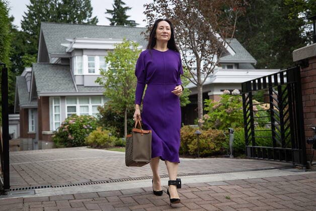 August 18, 2021, Vancouver, BC, Canada: Meng Wanzhou, chief financial officer of Huawei, leaves home to attend what is expected to be the final day of her extradition hearing at B.C. Supreme Court, in Vancouver, on Wednesday, August 18, 2021. Vancouver Canada - ZUMAc35_ 20210818_zaf_c35_035 Copyright: xDarrylxDyckx
