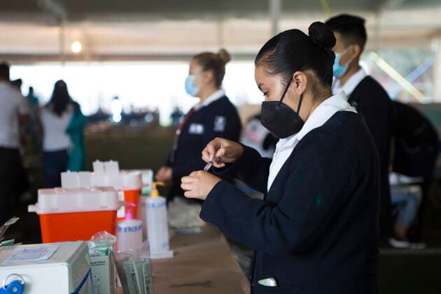 Coronavirus Vaccination In Mexico Free application of the first dose of the Pfizer vaccine against COVID-19, for people from 18 to 29 years old who live in the Xochimilco boroug, in Mexico City, Mexico, on August 19, 2021 Mexico City Mexico leyva-notitle210819_np6tA  Copyright: xCristianxLeyvax