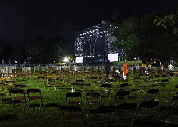 Fans are forced to evacuate before the completion of the We Love NYC: The Homecoming Concert In Central Park in New York City on Saturday, August 21, 2021. The Event ended abruptly when thunder storms and lightning related to Hurricane Henri moved into the area.  NYP20210821126 JohnxAngelillo
