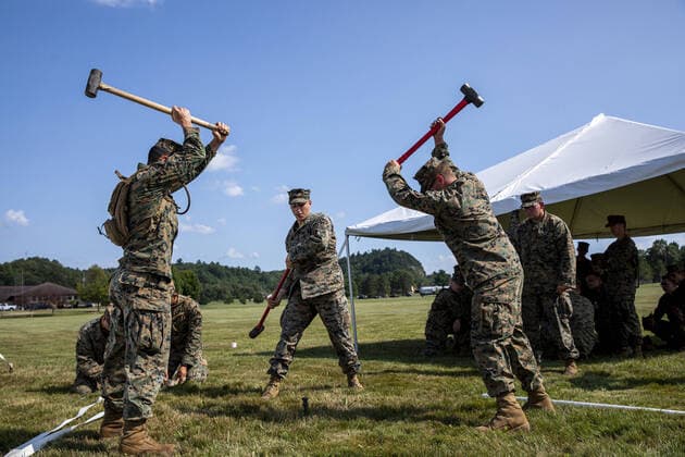 Bilder des Jahres 2021, News 08 August News Themen der Woche KW33 News Bilder des Tages U.S. Marines from Marine Wing Support Squadron 471 hammer a tent spike to raise reception tents for the arrival of Afghans at Volk Field Air National Guard Base, Wisconsin, on August 19, 2021. The Department of Defense, in support of the Department of State, is providing transportation and temporary housing in support of Operation Allies Refuge. This initiative follows through on America s commitment to Afghan citizens who have helped the United States, and provides them essential support at secure locations outside Afghanistan.  WAX2021082220 1stxSGT.xMICHELxSAURET