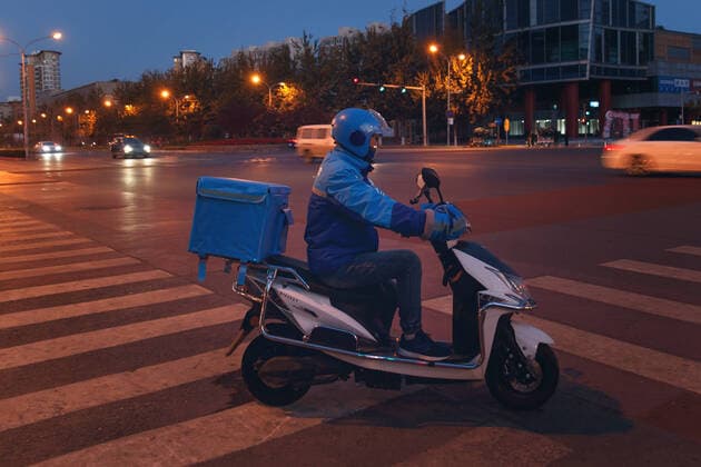 Take-away member of the working at night China, 10 11 2020, model released, Copyright: xViewxStockx, Ref:cpmh-217656f07w.jpg, Takeaway clerk,Service industry occupation,Delivery Person,Asia,Asian and Indian Ethnicities,East Asia,Oriental Ethnicity,china,Chinese Ethnicity,Adult,Young Adult,Men,Only Men,One Person,People,Outdoors,Riding,Motorbike,Road Intersection,Wait,Efficiency,Convenience,Struggle,Overalls,Hardhat,Security,Professional Occupation,Cold,Occupation,City Life,Street Light,Lighting Equipment,Service,Take Out Food,Expressing Positivity,Effort,Well-dressed,Night,Looking Away,Horizontal,Full Length,Side View,Photography,Color Image,Focus On Foreground,25-29 Years Copyright: xViewxStockx