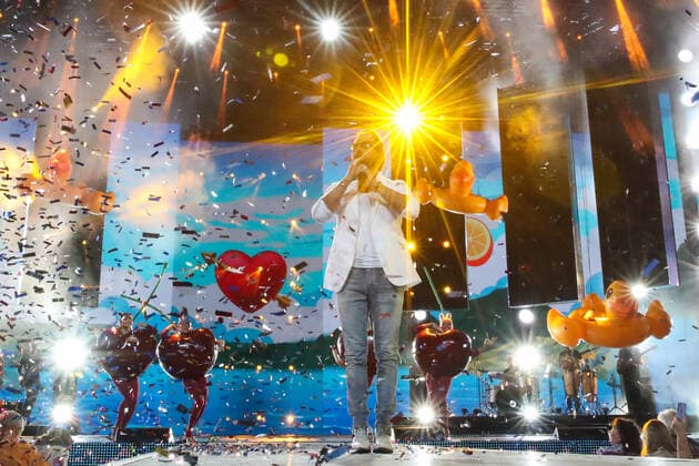 SOCHI, RUSSIA - AUGUST 25, 2021: Comedian Alexander Revva as Artur Pirozhkov (C) performs in a gala concert on the closing day of the 2021 New Wave Song Contest, an international competition for young pop music performers. Eleven singers representing nine countries took part in the contest, which ran from 19 to 25 August. Vyacheslav Prokofyev TASS  TS10DC52