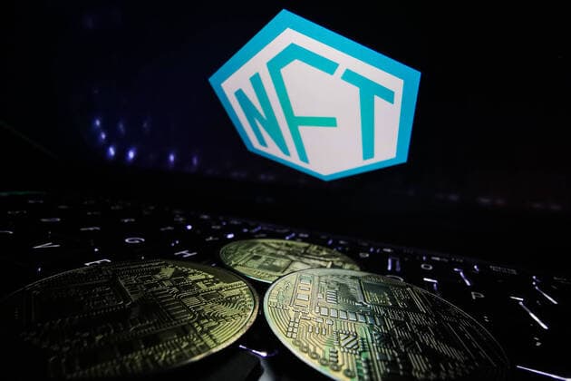 OpenSea Photo Illustrations NFT logo displayed on a laptop screen and representation of cryptocurrencies are seen in this illustration photo taken in Krakow, Poland on August 26, 2021. Krakow Poland porzycki-openseap210826_npMlt  Copyright: xJakubxPorzyckix