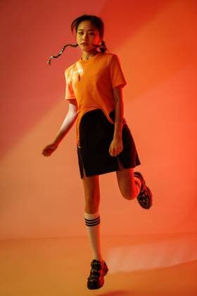 IMAGO Creative: Clickbait, Modetrends Personality of young girls China, 25 04 2021, model released, Copyright: xViewxStockx, Ref:cpmh-235164f07.jpg, Individuality,beautiful young girl,Youth Culture,Asia,Asian and Indian Ethnicities,East Asia,Oriental Ethnicity,People,china,Chinese Ethnicity,Females,Women,Adult,Young Adult,Young Women,Only Women,One Person,Beautiful,Well Being,Beauty,Teenage Girls,Indoors,Jumping,Feet Up,Vitality,Fashion,Punk,Relaxation,Cheerful,Cool,Expressing Positivity,Fun,Enjoyment,Confidence,Pride,Tsundere,Hip Hop,Orange,Descriptive Colour,Modern,Day,Looking At Camera,Vertical,Full Length,Color Image,Studio Shot,20-25 Years,Photography Copyright: xViewxStockx
