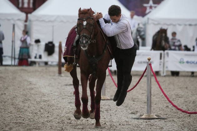Russland, MilitÃ¤rmusik-Festival in Moskau MOSCOW, RUSSIA - AUGUST 31, 2021: A member of the Kremlin Equestrian School performs during the 2021 Spasskaya Tower Military Music Festival in Moscowâ€™s Red Square. Vladimir Gerdo TASS  TS10E4F5