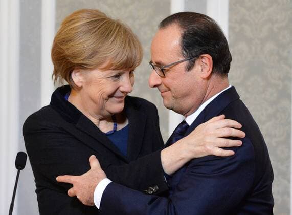 Russian, German, French and Ukrainian leaders meet for talks in Minsk 2571148 12.02.2015 German Federal Chancellor Angela Merkel and French President Francois Hollande at a news conference at Independence Palace in Minsk following peace talks on Ukraine between the Russian, German, French and Ukrainian leaders. Viktor Tolochko Sputnik Minsk Belarus  Copyright: xViktorxTolochkox