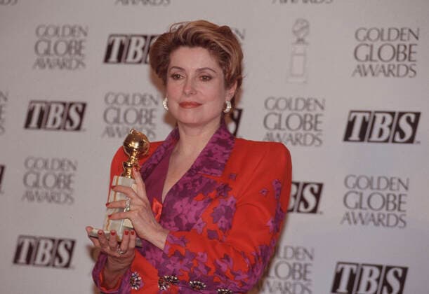 Catherine Deneuve Los Angeles.CA.USA. LIBRARY. Catherine Deneuve with a Golden Globe.Updated:25.08.2021. LMK30-SLIB250821PBOR-001 
