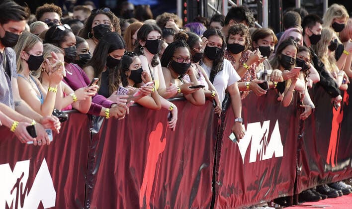 Face-masked music fans watch near the red carpet at the 38th annual MTV Video Music Awards at Barclays Center in New York City on Sunday, September 12, 2021.  NYP20210912108 JOHNxANGELILLO