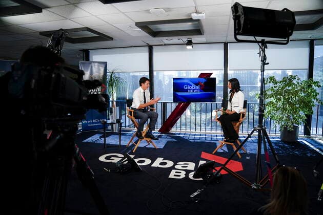 September 13, 2021, Burnaby, B.C, Canada: Liberal leader Justin Trudeau takes part in an interview with Global reporter Neetu Garcha in Burnaby, B.C., on Monday, Sept. 13, 2021. The interview was originally set to take part outside but had to be moved inside due to a lone protester heckling Trudeau. Burnaby Canada  - ZUMAc35_ 20210913_zaf_c35_069 Copyright: xSeanxKilpatrickx