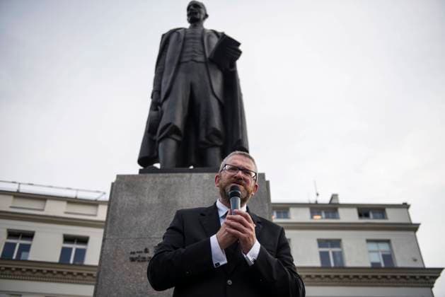 September 15, 2021, Warsaw, Masovia, Poland: Grzegorz Braun, president of Konfederacja (Confederation) political party is seen during the demonstration..Hundreds of people gathered outside the parliament in Warsaw to participate in a protest entitled Stop Sanitary Segregation organized by the Confederation (Konfederacja) far-right nationalist political party. Participants wanted to oppose sanitary segregation, coercion of COVID-19 vaccinations and the new Law 1449 - it is about the act on preventing and combating infections and infectious diseases in humans, which provides, inter alia, financial penalties for people who lie or conceal certain information during the epidemiological interviews. Warsaw Poland - ZUMAs197 20210915_zaa_s197_198 Copyright: xAttilaxHusejnowx
