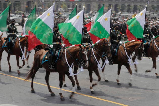 Military Parade On The Occasion Of The 211th Anniversary Of The Independence Of Mexico A Mexican army mounted brigade carries flags during the military parade in Mexico City s Zocalo, on the occasion of the 211th anniversary of Mexico s Independence. Mexico City Mexico vieyra-notitle210916_npKUV  Copyright: xGerardoxVieyrax