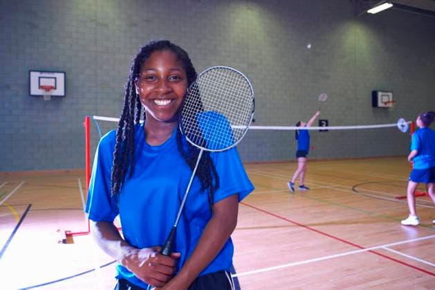 Young woman on badminton court, portrait, 15.09.2014, Copyright: xPeterxMullerx, model released, wearing,looking at camera,blue,front view,portrait,fitness,healthy lifestyle,confidence,badminton racket,18 to 19 years,african american ethnicity,female,woman,young woman,one person,badminton player,people in the background,indoors,badminton court,t-shirt,smiling,sport,September 2014 Release,African Descent,African American Ethnicity,Young Adult,18-19 Years,Female,Women,Young Women,Athlete,Badminton Player,Incidental People,People In The Background,Confidence,Blue,One Person,Smiling,Looking At Camera,Front View,Racket,Badminton Racket,Shirt,T-Shirt,Numeral,Indoors,Lifestyles,Healthy Lifestyle,Fitness,Woman,Young Woman,Wearing,Diversity,Inclu Ref:IS09AL06Q