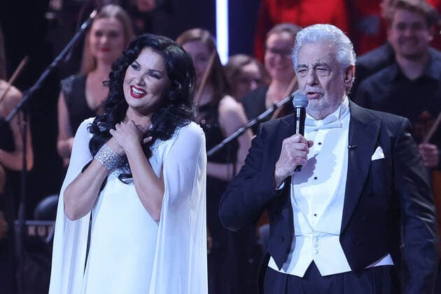 MOSCOW, RUSSIA - SEPTEMBER 18, 2021: Operatic soprano Anna Netrebko (L) and operatic tenor Placido Domingo perform in a concert marking Netrebko s 50th birthday, at the State Kremlin Palace. Vladimir Gerdo TASS  TS111088