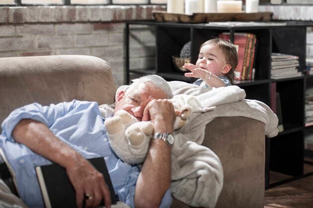 IMAGO Creative, Winter, Couching Baby girl touching sleeping grandfather on couch, 12.09.2016, Copyright: xZeroxCreativesx, model released, sleeping,wearing,grasping,holding,lying on back,touching,at home,city living,bonding,quality time,togetherness,relaxation,book,sofa,blanket,60 to 64 years,toddler,caucasian ethnicity,female,girl,baby girl,male,man,senior man,two people,house interior,indoors,living room,shirt,eyes closed,family,three generation family,granddaughter,grandfather,leisure,1 to 2 years,family with one child,house,enjoyment,both male and female,Star Images,September 2016 Release,Gesturing,Eyes Closed,Grasping,Reclining,Lying On Back,Resting,Sleeping,Touching,Holding,Caucasian Ethnicity,Senior Adult,60-64 Years,Child,Toddler,1-2 Years,Female,Girls,Girl,Bab Ref:IS09B1XT4