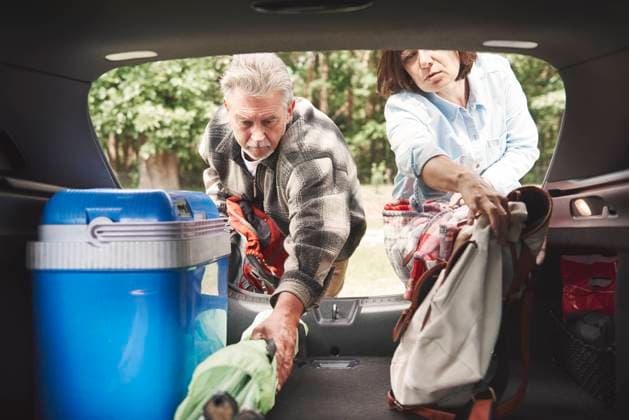 Mature couple removing camping equipment from car boot, 06.09.2017, Copyright: xGpointstudiox, model released, wearing,loading,unloading,escape,preparation,freedom,getting away from it all,camping equipment,open,cool box,mature adult,50 to 54 years,senior adult,60 to 64 years,female,woman,mature woman,male,man,senior man,heterosexual couple,two people,europe,poland,outdoors,day,casual clothing,leisure,car,automobile boot,both male and female,mature couple,September 2017 Release,podkarpackie,zdzary,Loading,Unloading,Mature Adult,50-54 Years,Senior Adult,60-64 Years,Female,Women,Male,Men,Senior Men,Couple,Mature Couple,Heterosexual Couple,Escape,Freedom,Preparation,Getting Away From It All,Open,Two People,Eastern Europe,Poland,Food Contain Ref:IS09B81ES