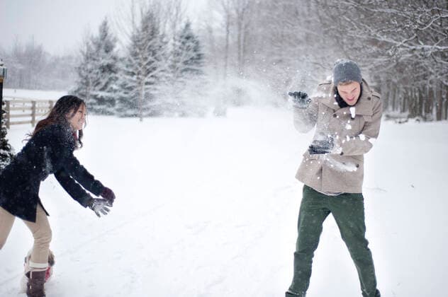 Young couple having snowball fight in snow covered forest, Ontario, Canada, 21.11.2018, Copyright: xSaraxMonikax, model released, wearing,playfighting,throwing,three quarter length,real people,bonding,carefree,sharing,togetherness,enthusiasm,friendship,happiness,love,tree,frozen,25 to 29 years,asian ethnicity,caucasian ethnicity,female,woman,male,man,heterosexual couple,young couple,two people,canada,ontario,outdoors,rural,forest,remote setting,winter,day,knit hat,jacket,jeans,winter clothing,energy,smiling,lifestyle,leisure,travel,vacation,snow,snowball,snowing,multi-ethnic couple,snowball fight,travel destination,both male and female,snow covered,November 2018 Release,caledon,Throwing,Asian Ethnicity,Caucasian Ethnicity,Young Adult,25- Ref:IS09BT4AV