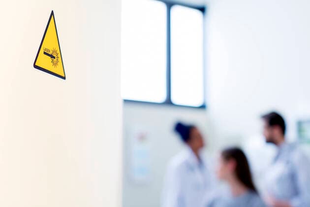 Laser warning sign on doctor s office door, 22.05.2017, Copyright: xInnocentix, model released, , property released, focus on foreground,triangle,teamwork,warning sign,40 to 44 years,25 to 29 years,caucasian ethnicity,hispanic ethnicity,female,woman,young woman,male,man,mature man,colleague,three people,medical occupation,doctor,door,indoors,doctors office,hospital,day,clinic,laser,healthcare,May 2017 Release,Caucasian Ethnicity,Mature Adult,40-44 Years,Young Adult,25-29 Years,Female,Women,Young Women,Young Adult Woman,Male,Men,Mature Men,Healthcare Occupation,Physician,Businesspeople,Teamwork,Small Group Of People,Three People,Selective Focus,Focus On Foreground,Laser,Musical Instrument,Percussion Instrument,Triangle,Message,Sign,Informa Ref:IS49AY6F