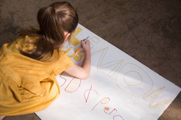 Girl crouching to colour in lemonade stand sign, 23.05.2017, Copyright: xKinzie+Riehmx, model released, colouring,wearing,crouching,making,yellow,waist up,making money,sell,at home,childhood,concentration,aspiration,creativity,innocence,refresh,sign,felt tip pen,child,caucasian ethnicity,girl,only one girl,one person,entrepreneur,united states of america,florida,orlando,outdoors,garden,summer,day,casual clothing,dress,drink,soft drink,lemonade,ponytail,lifestyle,orthographic text,leisure,homemade,only female,7 to 8 years,lemonade stand,May 2017 Release,Selling,Coloring,Crouching,Making,Thinking,Concentration,Caucasian Ethnicity,Child,Female,Girls,Girl,Aspiration,Childhood,Creativity,Innocence,Making Money,Refreshment,Homemade,Yellow,Pony Ref:IS49AZ1P