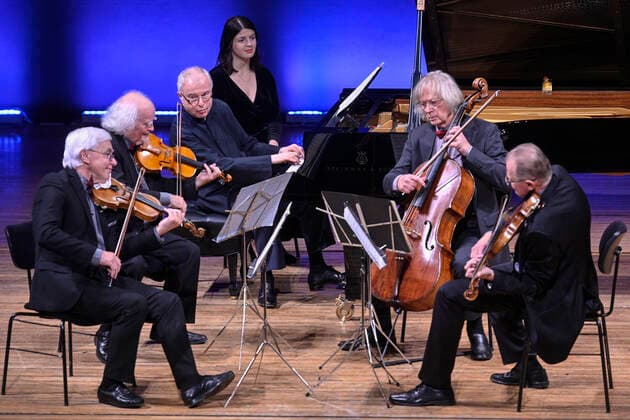British pianist Andras Schiff, center, performs with Panocha Quartet at Dvorak Prague music festival in Prague, Czech Republic, September 20, 2021. Andras Schiff received Antonin Dvorak award before the concert. (CTKxPhoto MichalxKamaryt) CTKPhotoP2021092009276 