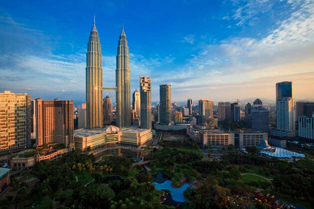 Malaysia, Kuala Lumpur, KLCC Park and Petronas Towers at dusk EAF00106
