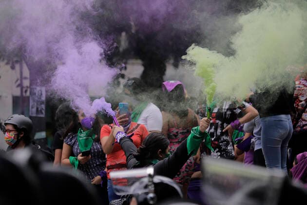Global Day Of Action In Favour Of Legal, Free And Safe Abortion In Mexico And Latin America A woman holds two flares as she marches from the Angel of Independence to the Zocalo in Mexico City for the Global Day of Action in favour of legal, free and safe abortion in Mexico and Latin America. During the march, there were clashes between demonstrators and police along the route. Mexico City Mexico vieyra-notitle210928_np7rT  Copyright: xGerardoxVieyrax