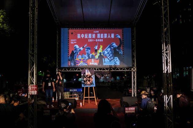 October 1, 2021, Taipei, Taiwan: (EDITOR S NOTE: Image contains profanity).An upside-down portrait of Xi Jinping, the Chinese President, is seen tagged on stage marked with a cross and the words fuck in front of the Legislative chamber on the national day of the People s Republic of China (PRC) in Taipei..Taiwan based human rights organizations and Hong Kong activists staged a demonstration to Resist China and call for unity and support for human rights in Taipei. Taipei Taiwan - ZUMAs197 20211001_zaa_s197_372 Copyright: xWalidxBerrazegx