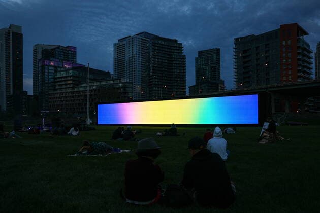 October 2, 2021, Toronto, on, Canada: Visitors attend the Continuum art project, designed by Toronto-based artist Krista Kim at Fort York National Historic Site in Toronto on Saturday, October 2, 2021. The exhibit featured a 100-foot long LED wall of light and sound, and is the first public art installation NFT (non-fungible token) Toronto Canada  - ZUMAc35_ 20211002_zaf_c35_142 Copyright: xEvanxBuhlerx