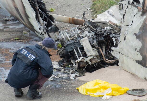 October 3, 2021, Montreal, PQ, Canada: A member of the Transportation Safety Board (TSB) inspects the wreckage of a plane at a crash site in Montreal, Sunday, Oct. 3, 2021. The small plane crashed on Ile Sainte-Helene near MontrealÃ¢â‚¬â ¢s Old Port on Saturday. Montreal Canada  - ZUMAc35_ 20211003_zaf_c35_004 Copyright: xGrahamxHughesx