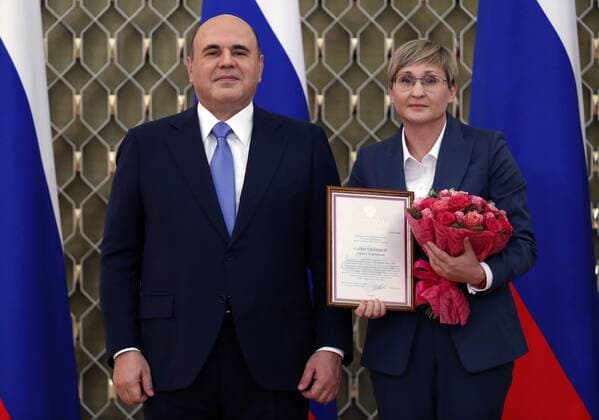Russia Mishustin Education Award 6666199 05.10.2021 Russian Prime Minister Mikhail Mishustin and Tatyana Saifutdinova, Director for Educational Programmes at the Orlyonok Russian Children s Centre, attend a ceremony to award commendations and state prizes in the field of education and mark Teachers Day, in Moscow, Russia. Dmitry Astakhov Sputnik Moscow Russia  Copyright: xDmitryxAstakhovx