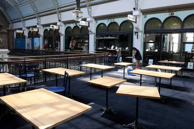NSW CORONAVIRUS COVID19, Staff prepare empty cafe seating areas for reopening, at the QVB in Sydney, Saturday, October 9, 2021. NSW is set to surpass another COVID-19 vaccination milestone, all but guaranteeing the state becomes one of the most vaccinated jurisdictions on the planet. ( NO ARCHIVING, EDITORIAL USE ONLY, NO USE IN BOOKS WITHOUT CONSENT SYDNEY NSW AUSTRALIA  Copyright: xDANxHIMBRECHTSx 20211009001584350754
