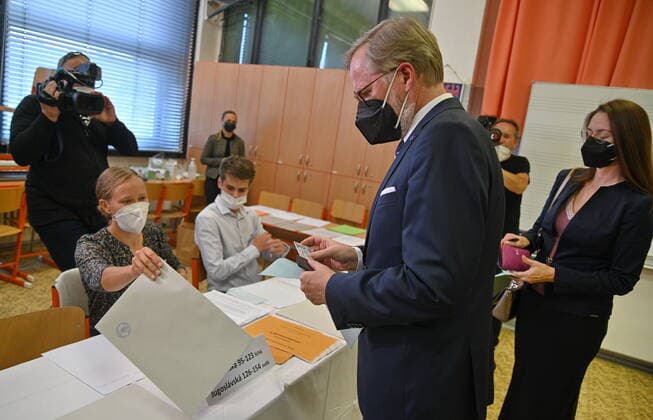 Chairman of the Czech political party ODS Petr Fiala of Spolu (Together) coalition votes during elections to the Chamber of Deputies of the Parliament of the Czech Republic, in Brno, Czech Republic, on October 8, 2021. (CTKxPhoto IgorxZehl) CTKPhotoF202110090437701 