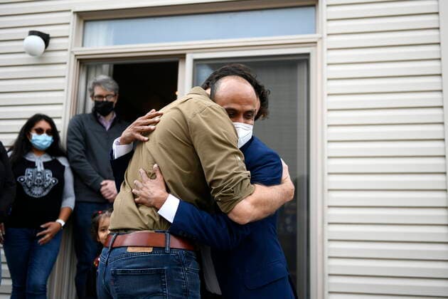 October 9, 2021, Ottawa, on, Canada: Prime Minister Justin Trudeau shares an embrace with Obaidullah Rahimi, who worked at the Canadian Embassy in Afghanistan and was recently resettled with his family in Canada, in Ottawa, on Saturday, Oct. 9, 2021. Ottawa Canada  - ZUMAc35_ 20211009_zaf_c35_004 Copyright: xJustinxTangx