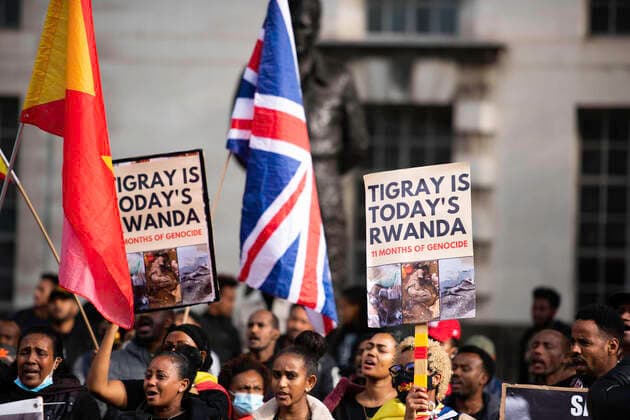 October 19, 2021, London, United Kingdom: A protester holds a placard reading Tigray is Today s Rwanda during the Tigray Genocide Protest near 10 Downing Street in London..Protesters staged a protest against what they call a genocidal war by Ethiopia and Eritrea on the region of Tigray, and called on the UK and the international community to help the people of Tigray. London United Kingdom - ZUMAs197 20211019_zaa_s197_080 Copyright: xLoredanaxSangiulianox
