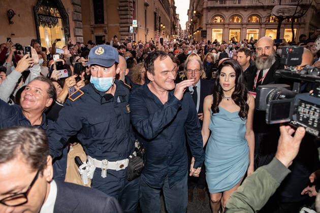 Quentin Tarantino in via Condotti. In the photo: Quentin Tarantino with his wife Daniela Pick and Gianni Battistoni (center)  Copyright: x xIPAx xRomax
