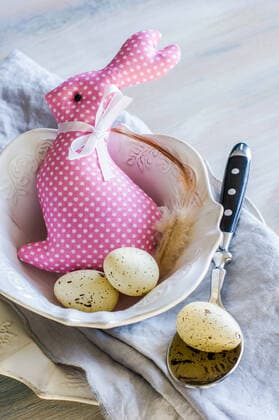 Table setting for Easter dinner with eggs on white wooden table Copyright: xAnnaxBogushx 38376712
