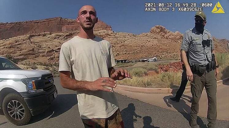 September 21, 2021, Moab, Utah, USA: In a screenshot taken from a video that was shot on Aug. 12, 2021, and provided by , BRIAN LAUNDRIE talks to a police officer after police pulled over the van he was traveling in with his girlfriend, Gabby Petito, near the entrance to Arches National Park. The couple was pulled over while they were having an emotional fight. Laundrie s fiancÃˆ Gabby Petito s body was found in a national park in Wyoming after being reported missing by her parents. Moab USA - ZUMA 20210921_new_z03_036 Copyright: xThexMoabxPolicexDepartmentx