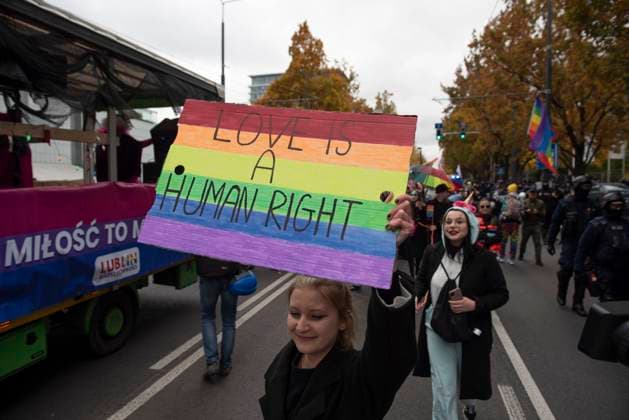 October 23, 2021, Lublin, Warsaw, Poland: A woman holds a placard during the Lublin pride parade on October 23, 2021 in Lublin, Poland. Several hundreds of people participated in the 3rd Lublin Pride parade marching through the city in a halloween themed parade. Lublin Poland - ZUMAk156 20211023_zip_k156_003 Copyright: xAleksanderxKalkax