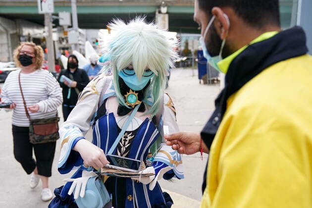 October 23, 2021, Toronto, on, Canada: A cosplayer shows her vaccine passport to gain entrance to FAN EXPO Canada: LIMITED EDITION in Toronto on Saturday, Oct. 23, 2021. Toronto Canada  - ZUMAc35_ 20211023_zaf_c35_047 Copyright: xEvanxBuhlerx