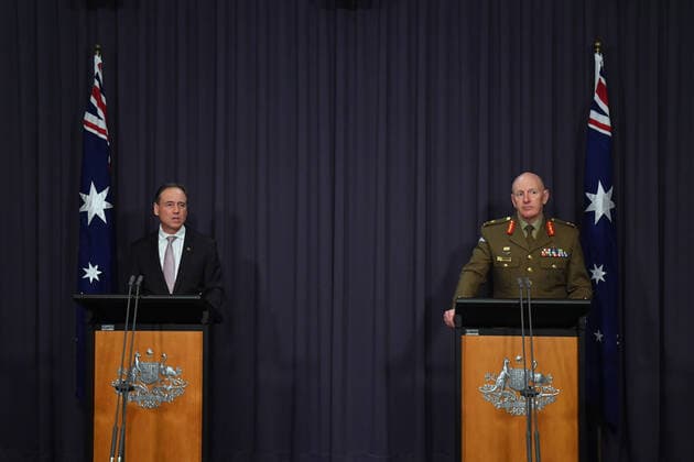 GREG HUNT PRESSER, Minister for Health Greg Hunt and COVID-19 Taskforce Commander, Lieutenant General John Frewen at a press conference at Parliament House in Canberra, Sunday, October 24, 2021. ( NO ARCHIVING, EDITORIAL USE ONLY, NO USE IN BOOKS WITHOUT CONSENT CANBERRA ACT AUSTRALIA  Copyright: xMICKxTSIKASx 20211024001588922049