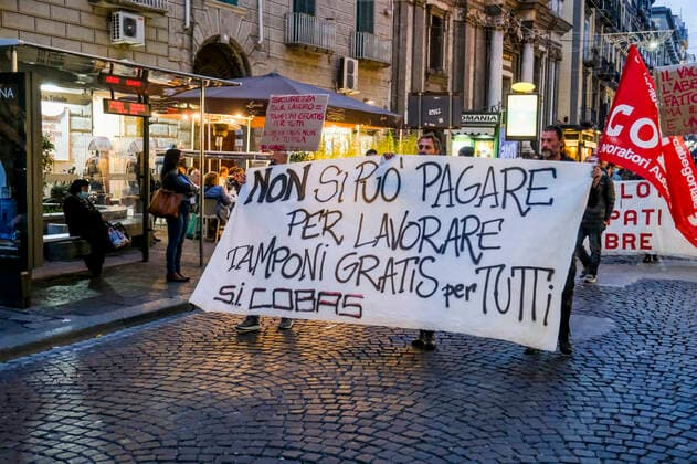 Italy: NO Greenpass demonstration in Naples Students, workers and unemployed people march through the streets of naples on 25 october 2021, to express their disagreement with the measures taken by the italian government to counter the spread of COVID-19 using the GREENPASS, chanting choruses against the government pointing to Mario Draghi President of the Council of Ministers of the Italian Republic as the person responsible DSCF0112 Copyright: xAntonioxBalascox