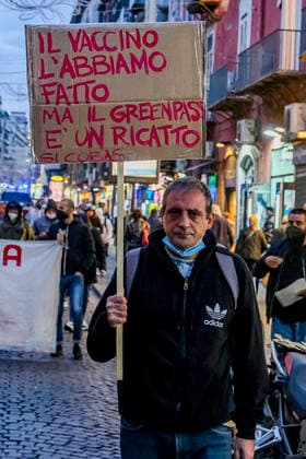 Italy: NO Greenpass demonstration in Naples Students, workers and unemployed people march through the streets of naples on 25 october 2021, to express their disagreement with the measures taken by the italian government to counter the spread of COVID-19 using the GREENPASS, chanting choruses against the government pointing to Mario Draghi President of the Council of Ministers of the Italian Republic as the person responsible DSCF0121 Copyright: xAntonioxBalascox