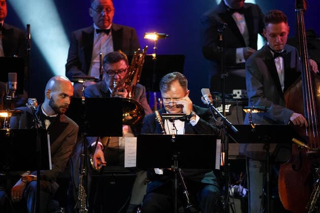 MOSCOW, RUSSIA - OCTOBER 27, 2021: Musicians of the Jazz at Lincoln Center Orchestra and Russian jazz saxophonist Igor Butman (C) perform during a gala concert marking Butmanâ€™s 60th birthday at the State Kremlin Palace. The concert is held in the COVID-free format. Valery Sharifulin TASS  TS115F30