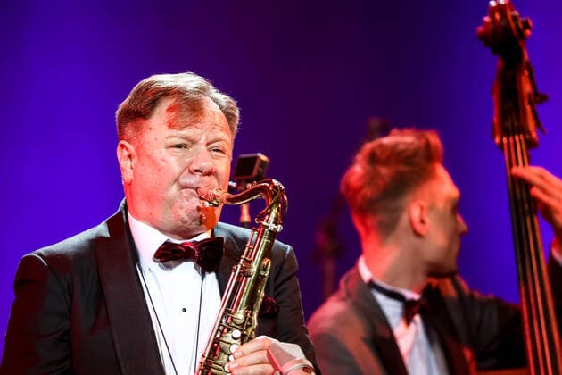 MOSCOW, RUSSIA - OCTOBER 27, 2021: Russian jazz saxophonist Igor Butman performs with the Jazz at Lincoln Center Orchestra during a gala concert marking his 60th birthday at the State Kremlin Palace. The concert is held in the COVID-free format. Valery Sharifulin TASS  TS115F5F