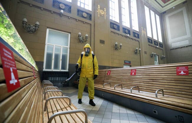 MOSCOW, RUSSIA â€“ OCTOBER 28, 2021: An employee of the Lider Centre for Special Risk Rescue Operations of Russia s Emergencies Ministry carries out disinfection procedures at the Kiyevsky railway station amid the COVID-19 pandemic. Mikhail Tereshchenko TASS  TS116125