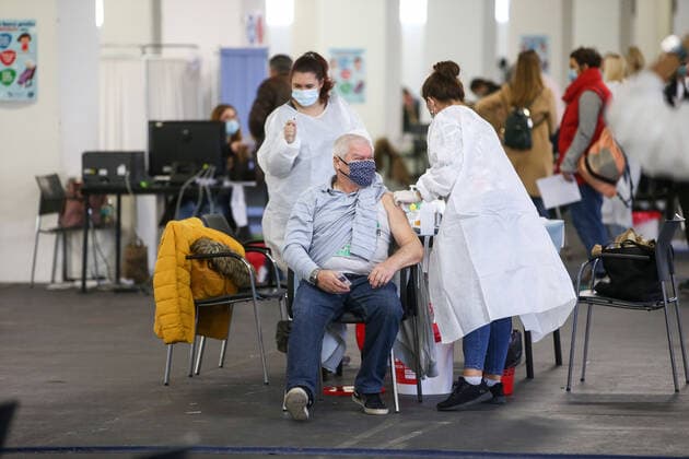 PXL_Vaccinations Man receives a dose of the vaccine against the coronavirus disease (COVID-19) at Zagreb Fair, in Zagreb, Croatia, on October 28, 2021. MatijaxHabljak PIXSELL