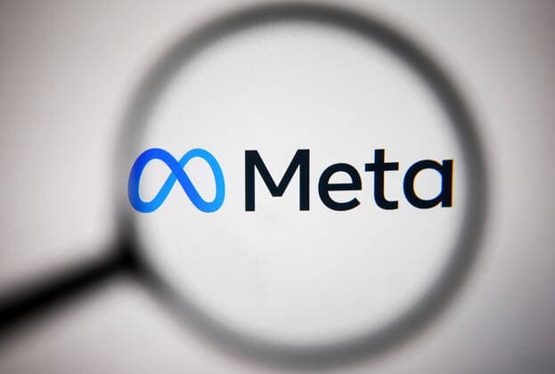 Facebook Renames Itself To Meta Meta Platforms Inc. logo is pictured through a magnifying glass in this illustrative photo taken in Kyiv on 29 October, 2021. Facebook renames itself to new company brand Meta, Chief of Facebook Mark Zuckerberg said on 28 October 2021. Kyiv Ukraine  Copyright: xSTRx sindeyev-notitle211029_npcuS